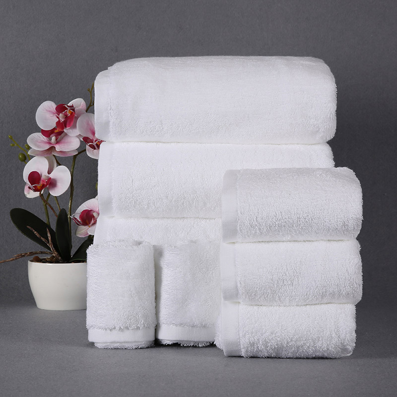 white cotton hotel bath towel