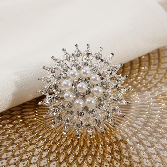 Sparkling intricate crystal flower on silver bevelled ring